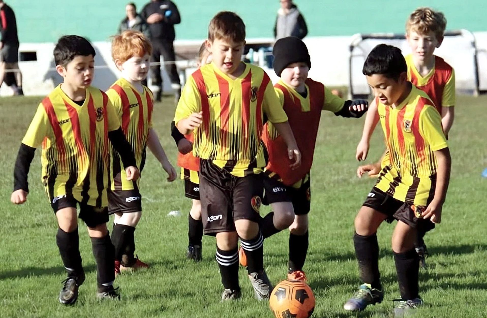 young team playing football