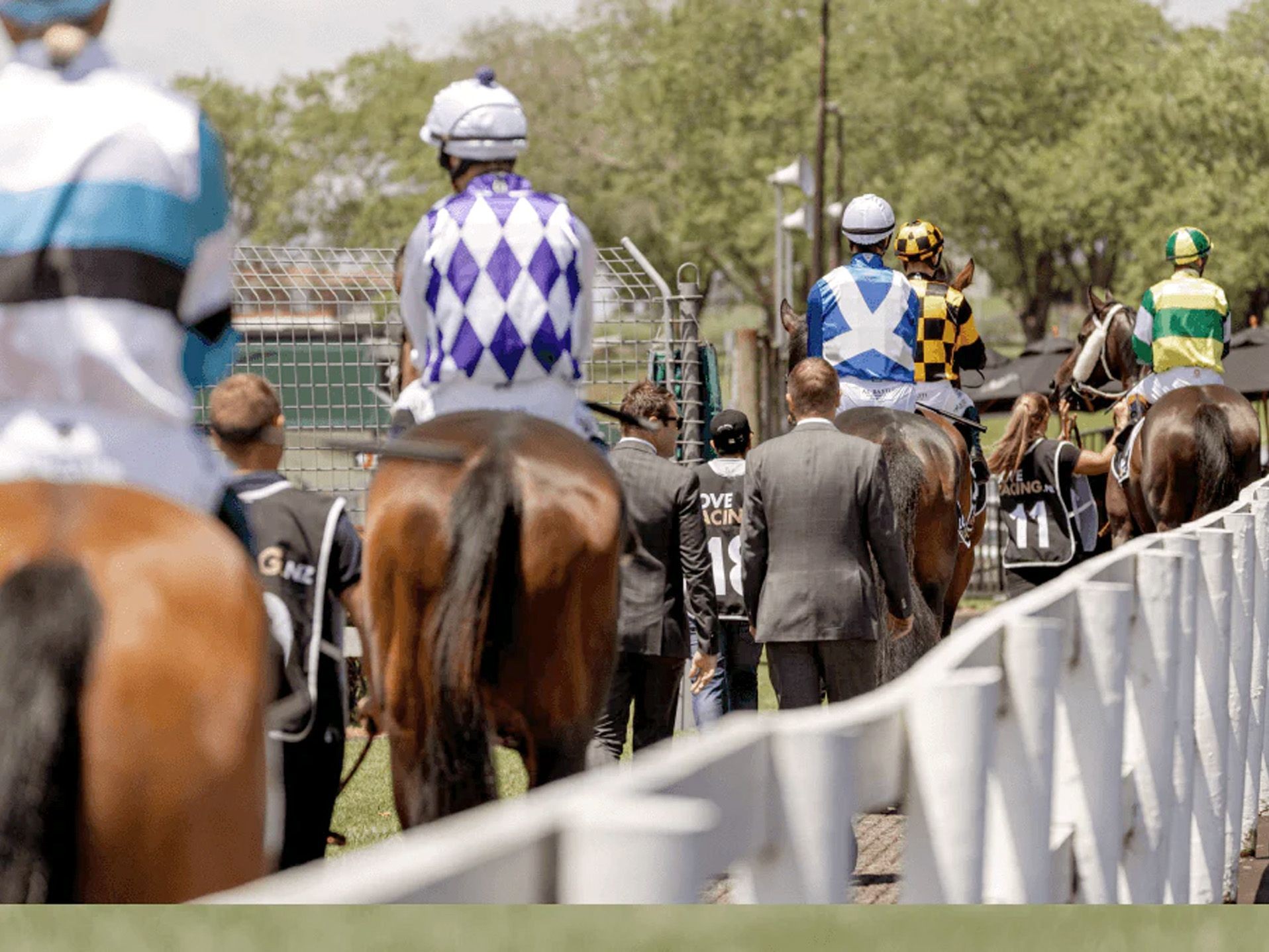 horses and players walking forward